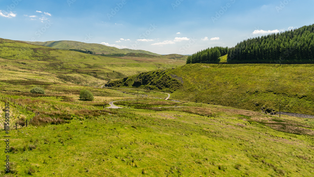 Welsh landscape and a country road near the Nant-y-Moch Reservoir, Ceredigion, Dyfed, Wales, UK