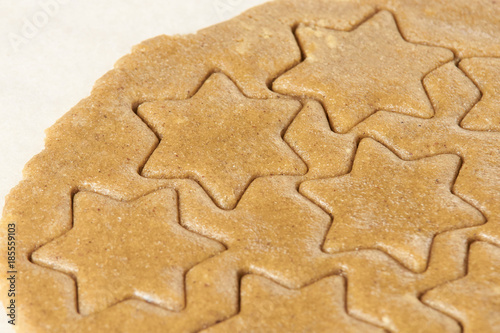 Pattern ginger biscuits. Raw dough. Star shape