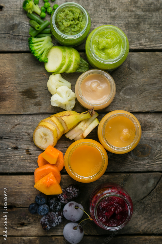 Colorful baby food purees in glass jars Colorful baby food purees in glass jars