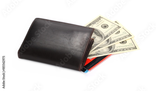 US hundred dollar bills and credit, debit cards in brown wallet, isolated on white background 