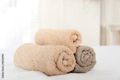Clean towels on bed