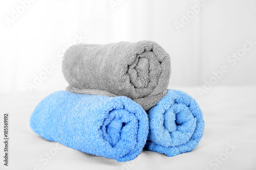 Clean towels on bed