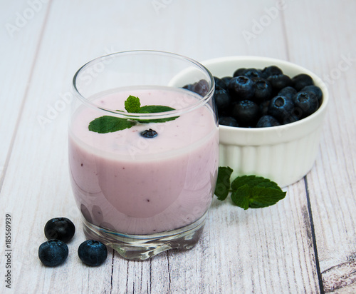 Glass with blueberry yogurt