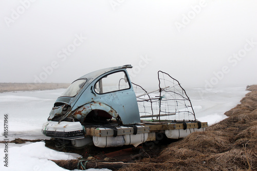 Self made raft on frozen lake
