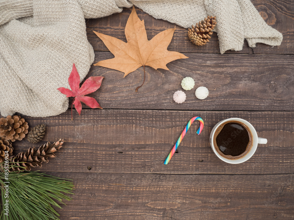 Hot coffee, bise and colorful candy on a wooden table Hot coffee, bise and colorful candy on a wooden table