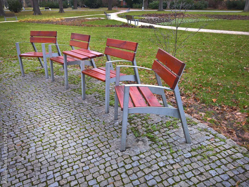 Empty park banches and seats  in November
