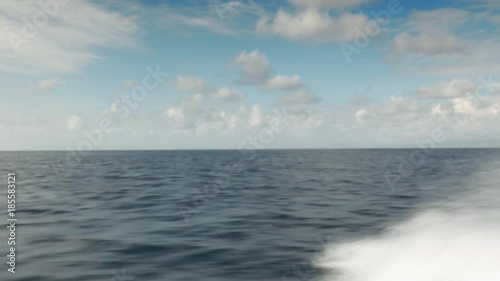 Wallpaper Mural Speed boat travelling bow wave splashing water pacific ocean horizon Indonesia July 2017 Torontodigital.ca