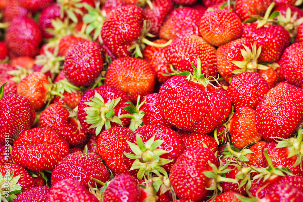 Ripe strawberries on the market. Sale of berries. Fruit and vegetable market
Ripe strawberries on the market. Sale of berries. Fruit and vegetable market