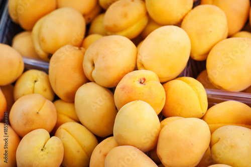 Ripe apricots in the fruit and vegetable market  