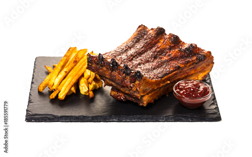 grilled ribs with fries and sauce