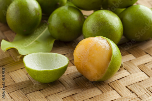 Fresh peeled quenepa fruit photo