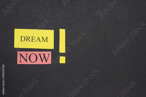 Dream now inscription with exclamation mark