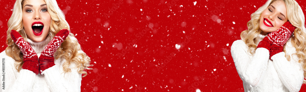 Fototapeta premium Beautyful blond woman with christmas box gift on red background.