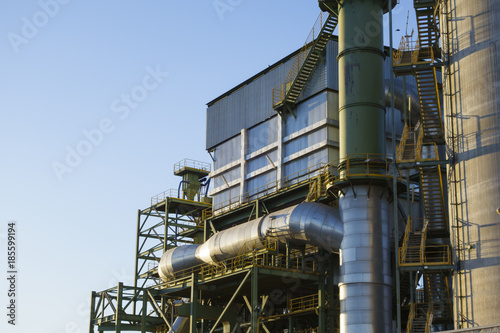 Industrial building against blue sky