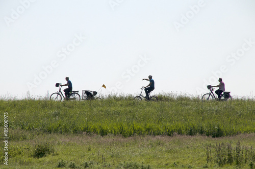 bikers on the dike