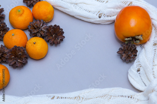 Mandarins and cones in a Christmas composition photo
