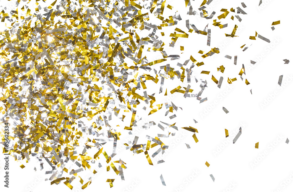 Photo of golden confetti on a white background. Photo of golden confetti on a white background.