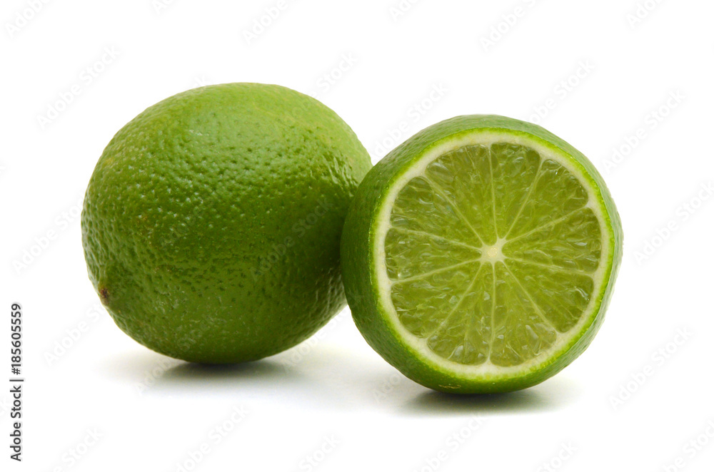 green lemon and slice isolated on white green lemon and slice isolated on white