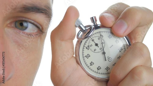 Close up man starting up a stopwatch at white isolated background