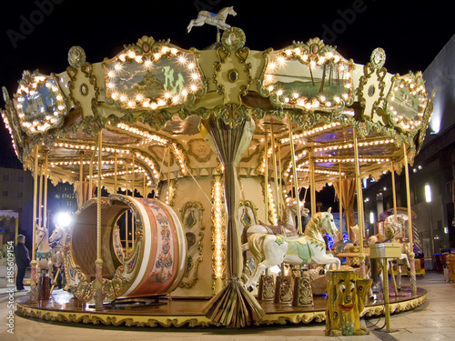 An old fashioned carousel at night