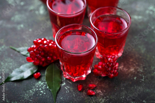 Glasses of fresh pomegranate juice.