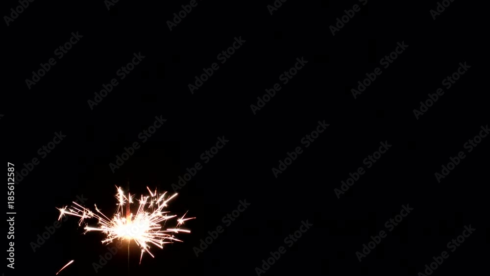 Christmas Bengal lights on a black background. Sparks go out. Christmas Bengal lights on a black background. Sparks go out.