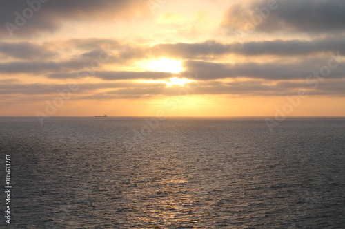 cloudy sun over the sea © suIT-blog