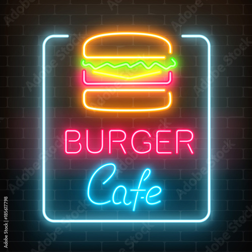 Neon burger cafe glowing signboard on a dark brick wall background. Fastfood light billboard sign.