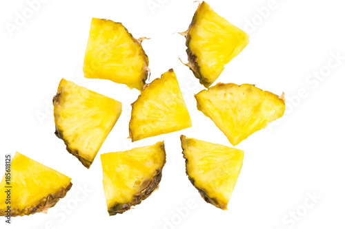 Pinneapple slices pattern on white background top view