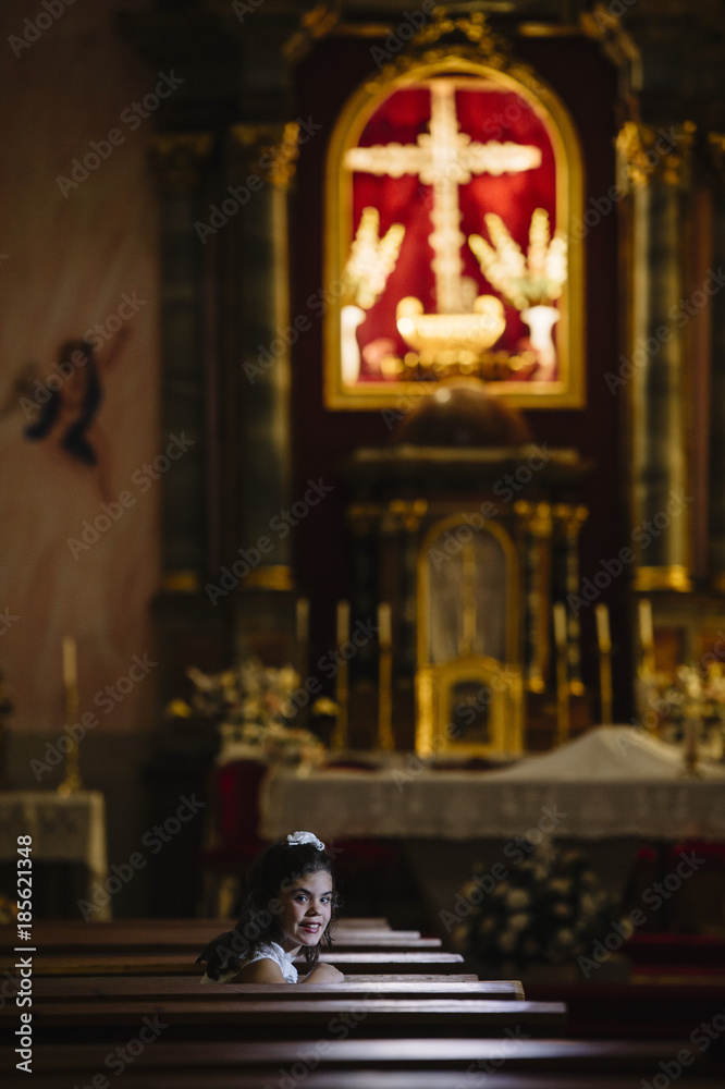 Young girl in the church Young girl in the church