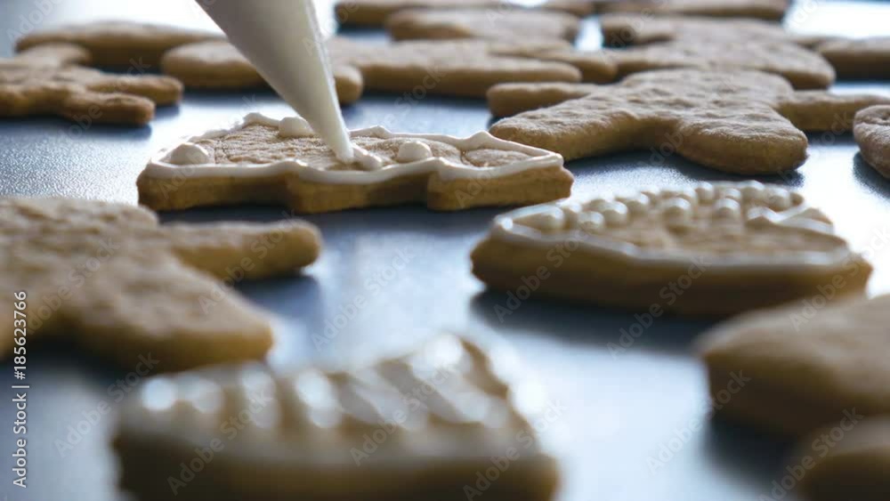 Cookie in shape of christmas tree is decorated with glaze, closeup color graded Cookie in shape of christmas tree is decorated with glaze, closeup color graded