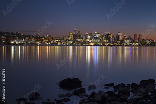 Sunset over Seattle's skyline creating reflections in Lake Washington