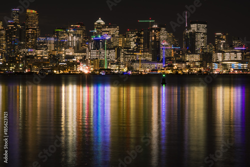 Seattle skyline at night reflecting in Lake Washington