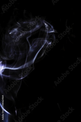 colored smoke on a black background