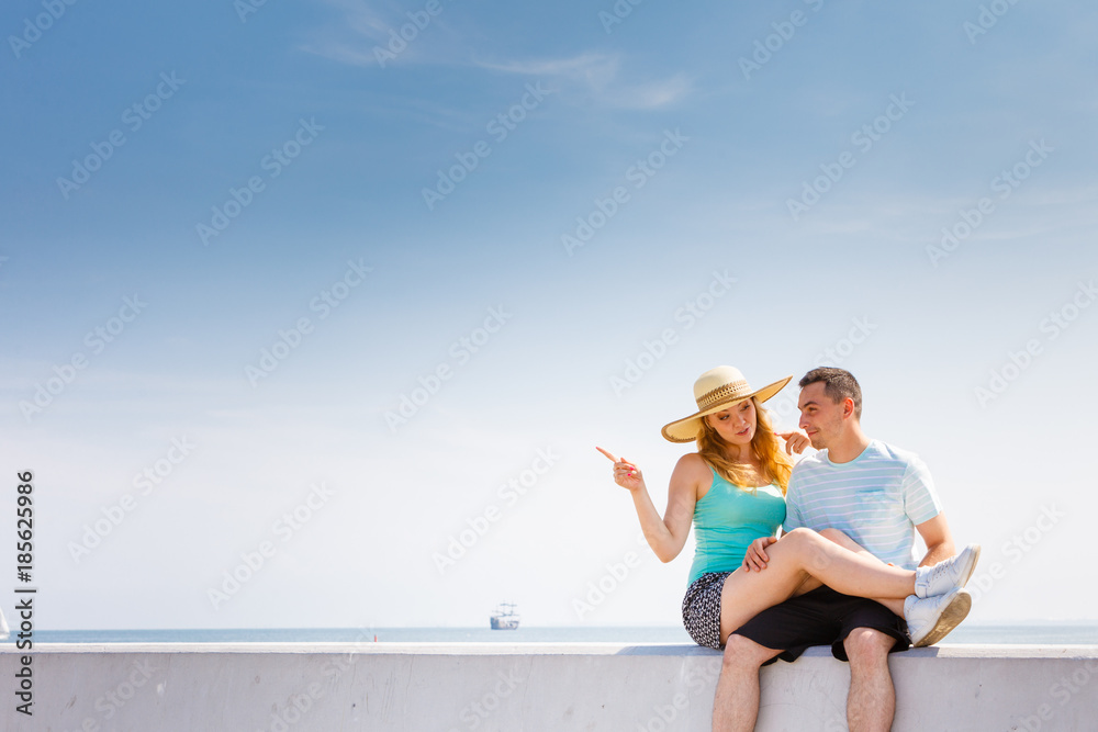 Man and woman sitting together outside Man and woman sitting together outside