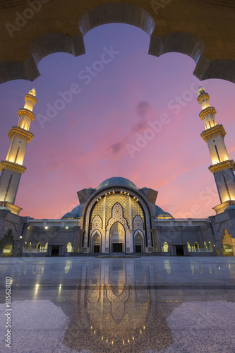 view of Federal Territory Mosque or Masjid Wilayah with beautiful sunset, in Kuala Lumpur, Malaysia