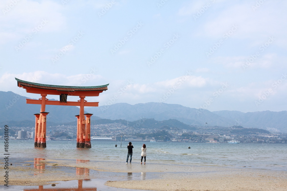 Itsukushima Shinto shrine Torii gate, Miyajima at low tide Itsukushima Shinto shrine Torii gate, Miyajima at low tide