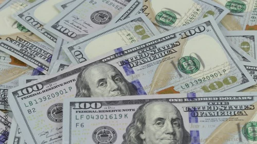 Rotation paper money close-up. Background with money american hundred dollar bills