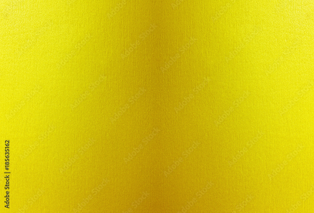 Obraz premium Shiny yellow leaf gold foil texture background.