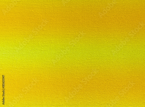 Shiny yellow leaf gold foil texture background.