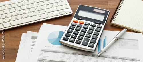 Financial accounting with calculator photo