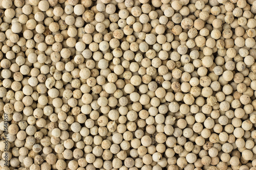 white pepper spice as a background, natural seasoning texture