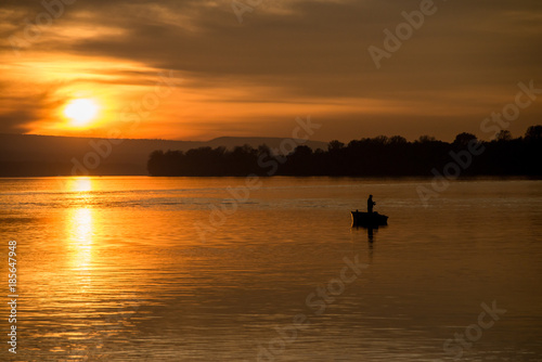 Fishing on a boat at sunset © anderm