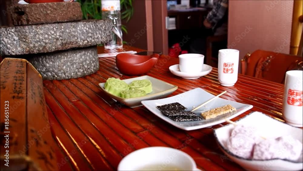 Traditional Chinese tea ceremony in Taiwan with a teapot, tea cups