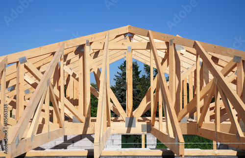 Roof trusses. Roofing Construction House Roof Building.Timber roof truss. Trusses and Framing Home Roof.