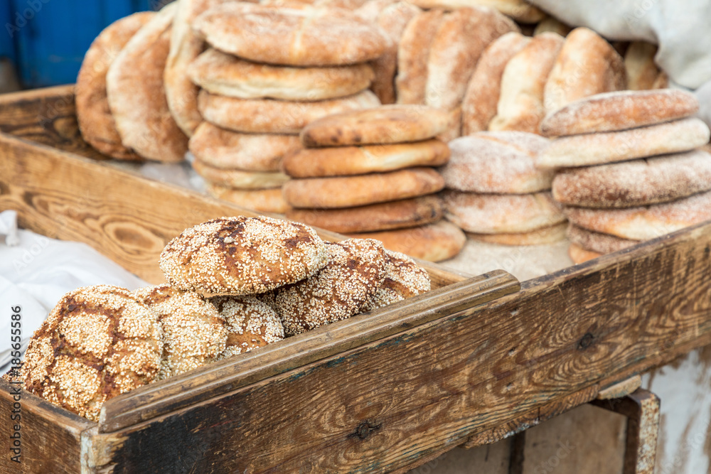 Typical traditional Moroccan bread sesame seeds on street food stall, Marrakesh, Morocco