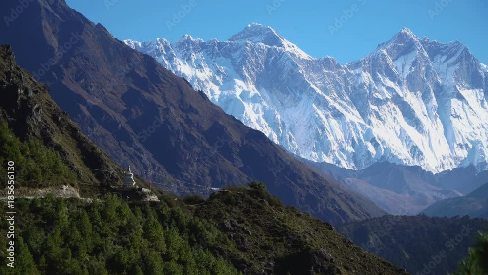 The Buddhist stupa on the hiking trail to the base camp of Everest. The concept of adventure and travel. The Buddhist stupa on the hiking trail to the base camp of Everest. The concept of adventure and travel.