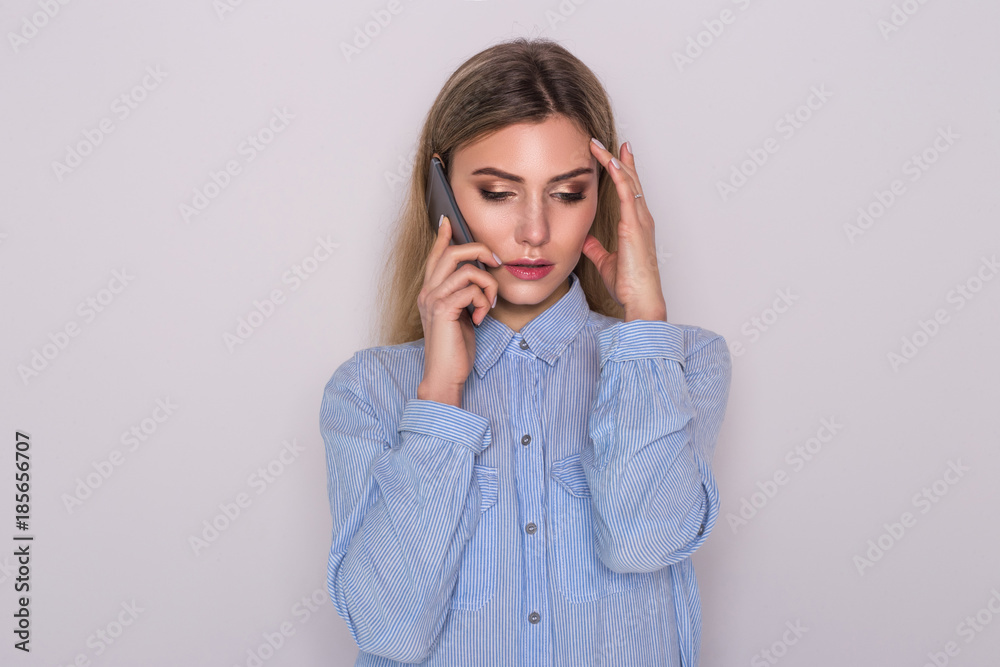 Too many calls in one day. Businesswoman having a headache. Too many calls in one day. Businesswoman having a headache.