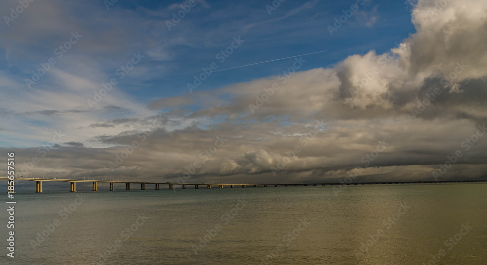 Vasco da Gama bridge with a cloudy sky