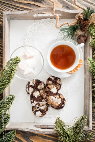 Chocolate cookies. Cookie with cracks. Cracked chocolate biscuits. Christmas chocolate cookies. Christmas biscuits. Chocolate cookies with cracks. photo